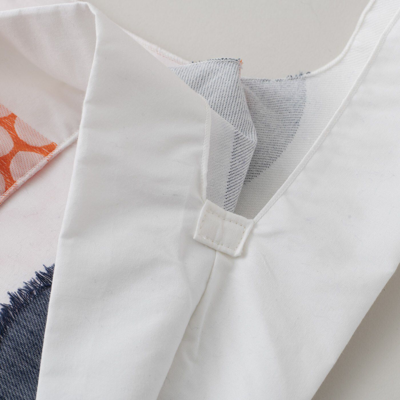 ＆Stories|テキスタイルデザイナーと作った　播州ジャカード織のドレスバッグ〈エン・ホワイト×ピンク〉|長くご使用いただけるように、鞄の入れ口の両サイドは補強してあります。