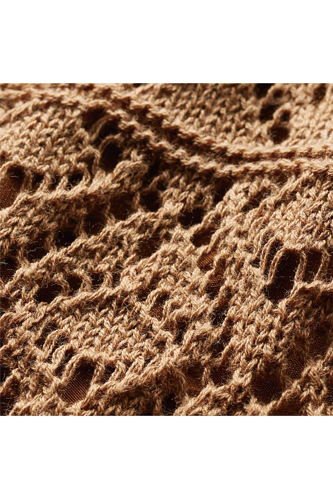 Live in  comfort|リブ イン コンフォート　ほどゆるラインとのびのび裏地で　はき心地も抜群　大人レディーな綿ニットスカート〈ネイビー〉|綿100％の糸を凝ったモチーフを組み合わせた透かし編みに。　※お届けするカラーとは異なります。