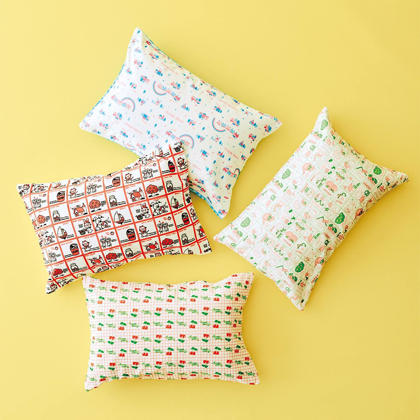 フェリシモの雑貨 Kraso|シモジマコラボ　包装紙で枕をラッピング　リバーシブル枕カバーの会