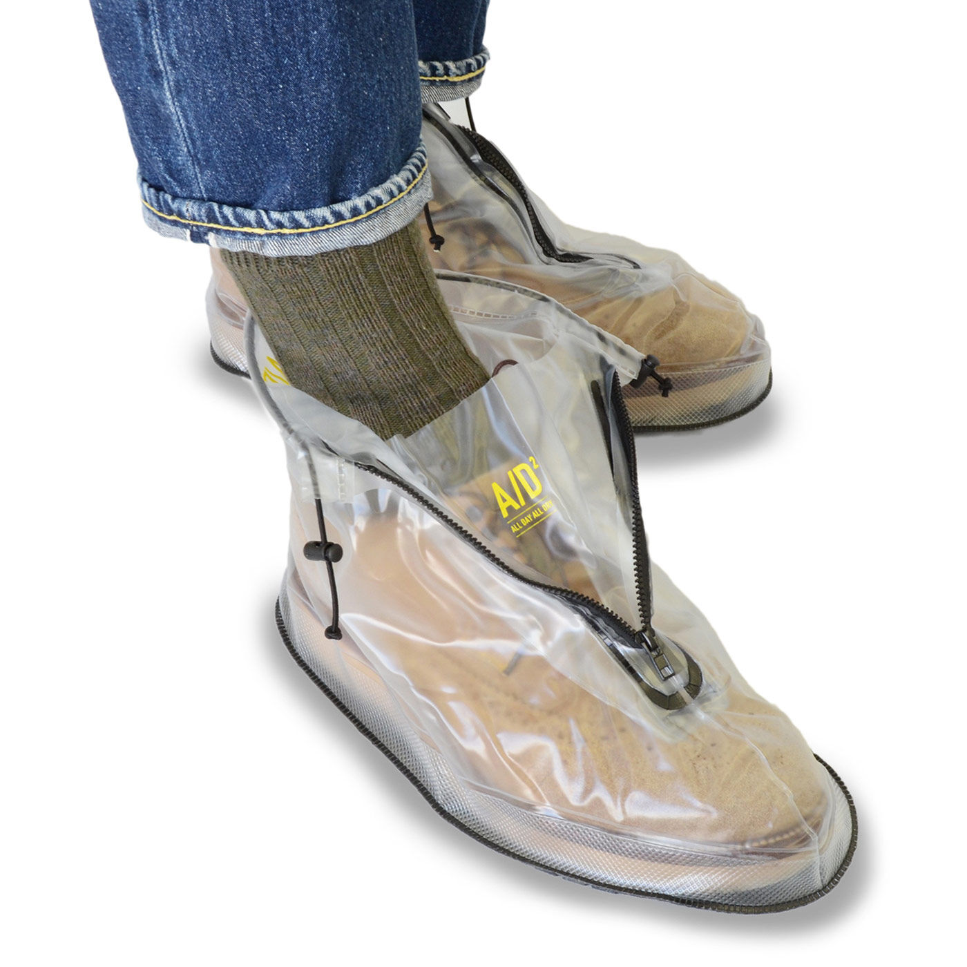 フェリシモの雑貨 Kraso|靴を雨や泥から守る　たたんで持ち歩けるシューズレインカバー〈黒〉|※画像は色違いの透明のLサイズ〈透明〉。